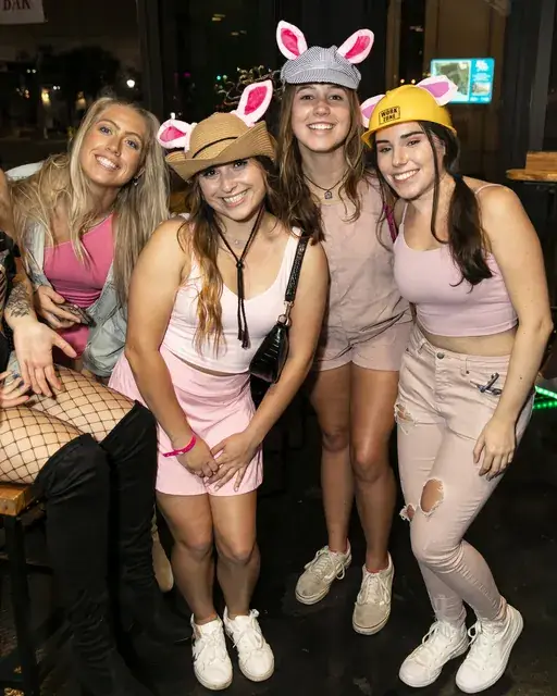 Friends wearing bunny ears at a Downtown Crawlers Halloween crawl